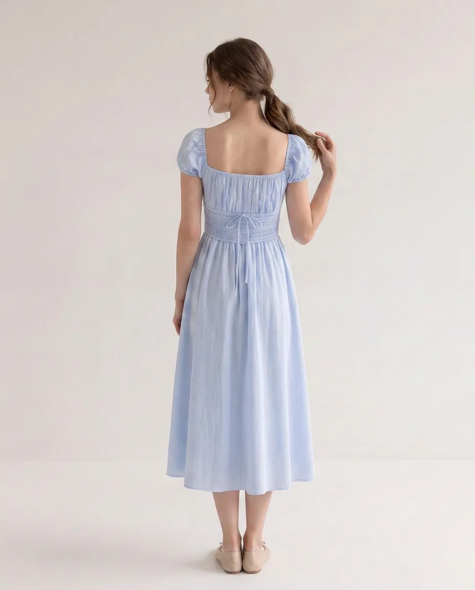 Back view of the Celeste Midi Dress in blue